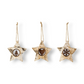 Mellow Monkey set of three rustic birch bark star ornaments with iron tree, heart, and snowflake cut-out details.