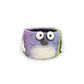 Mellow Monkey whimsical poly-resin bird planter in purple, white, and green with large googly eyes and a small nose.