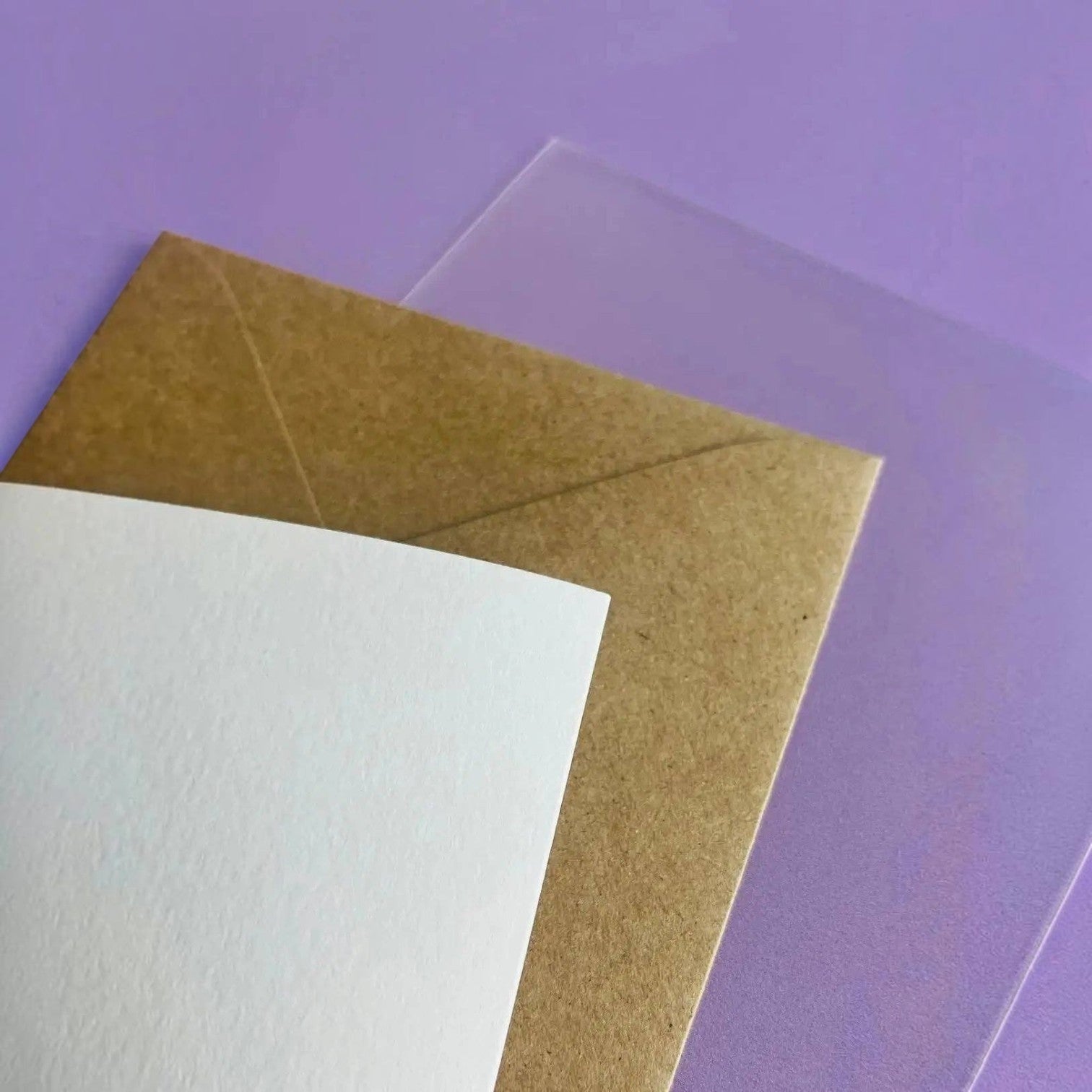 Mellow Monkey 21st birthday card with textured white cotton cardstock, brown Kraft envelope, and clear cello sleeve.