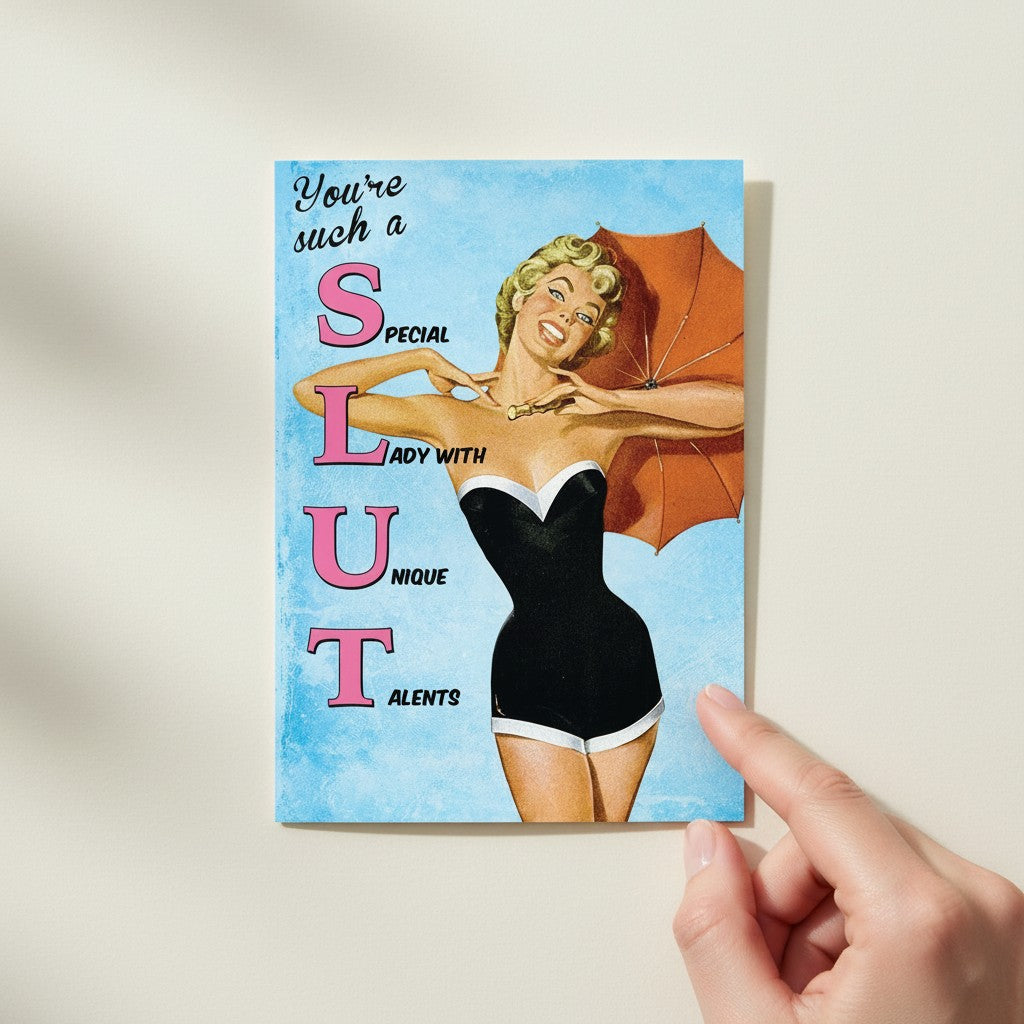 Mellow Monkey birthday card featuring a retro illustration of a woman in a black swimsuit holding an orange umbrella. Text reads 'You're such a S.L.U.T. Special Lady With Unique Talents.'