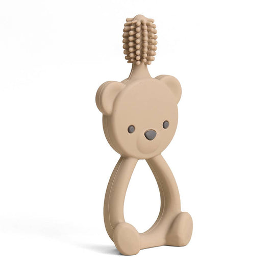 Mellow Monkey Bitzy 360-degree silicone training toothbrush in beige featuring a cute bear-shaped handle.