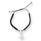 Mellow Monkey Kitt adjustable black braided bracelet featuring a gold-tone anchor charm with embedded crystals.