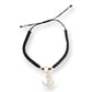 Mellow Monkey Kitt adjustable bracelet featuring a black braided band and a gold-tone anchor charm with crystals.
