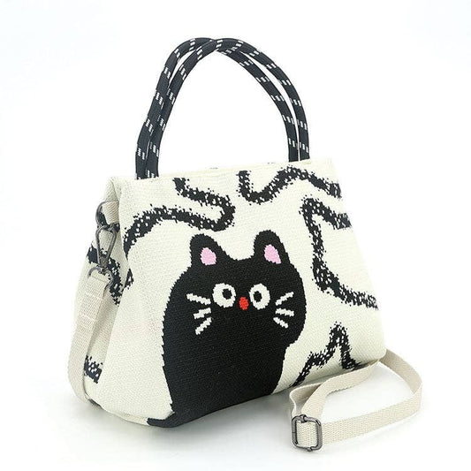 Mellow Monkey 2-piece black cat shoulder bag set in durable polyester with top handles and adjustable strap.