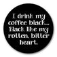 Mellow Monkey 1.25-inch round pin-back button with black background and white text about coffee and a bitter heart.