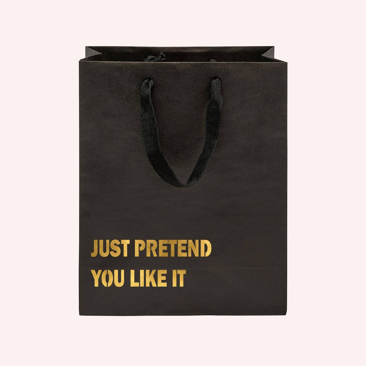 Mellow Monkey black heavy-duty kraft paper gift bag with gold foil text reading Just Pretend You Like It