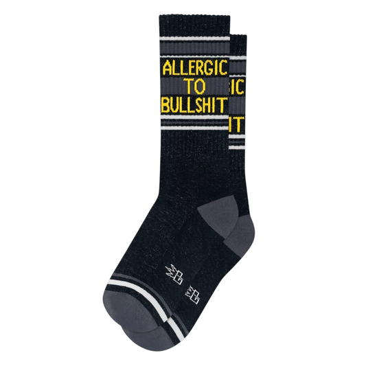 Mellow Monkey black mid-calf gym socks featuring yellow text that reads Allergic To Bullshit with white stripes