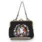 Mellow Monkey black linen kisslock bag featuring embroidered ghosts, snake, and floral wreath with bee detail.