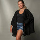 Mellow Monkey black 4-layer muslin kimono robe with golden moon phases on back, worn by a woman with denim shorts.