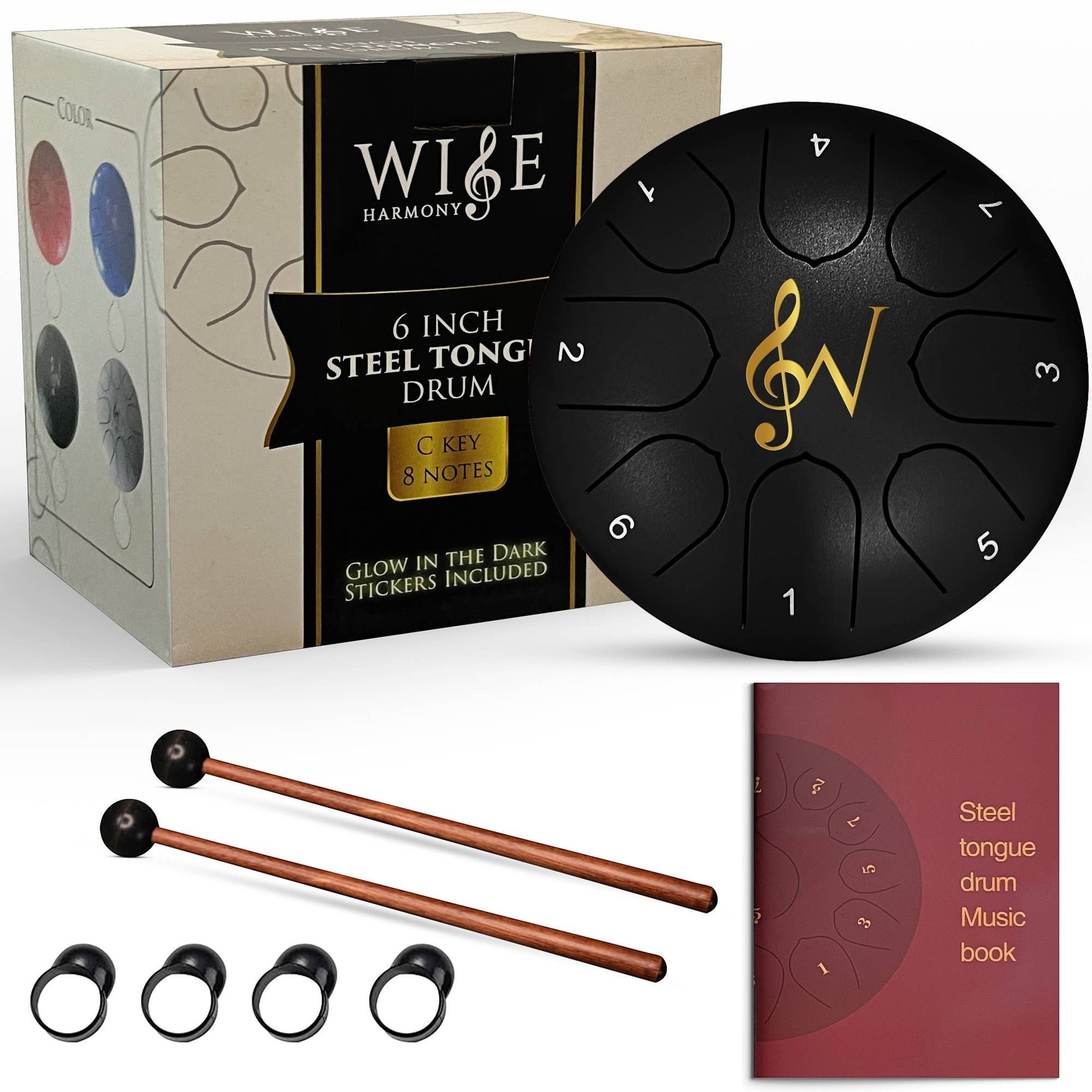 Mellow Monkey 6-inch black steel tongue drum with 8 notes, gold musical symbol, and included mallets and music book.