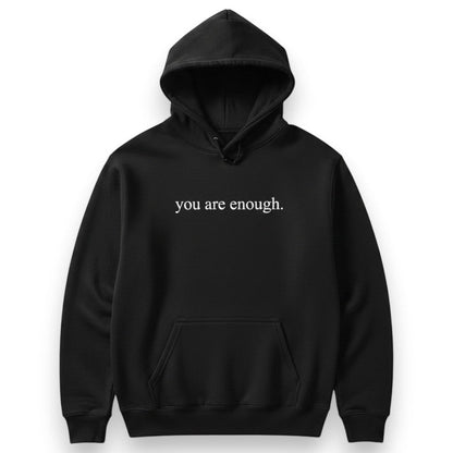 Mellow Monkey black unisex hoodie with "you are enough." printed on the front. Soft and durable.