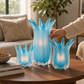 Mellow Monkey set of 3 hand-blown blue art glass candle holders or vases with a unique petal-like design