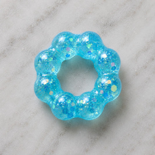 Mellow Monkey Blue Blast Feelzies Original sensory bracelet with glittery, squishy, donut-shaped design.