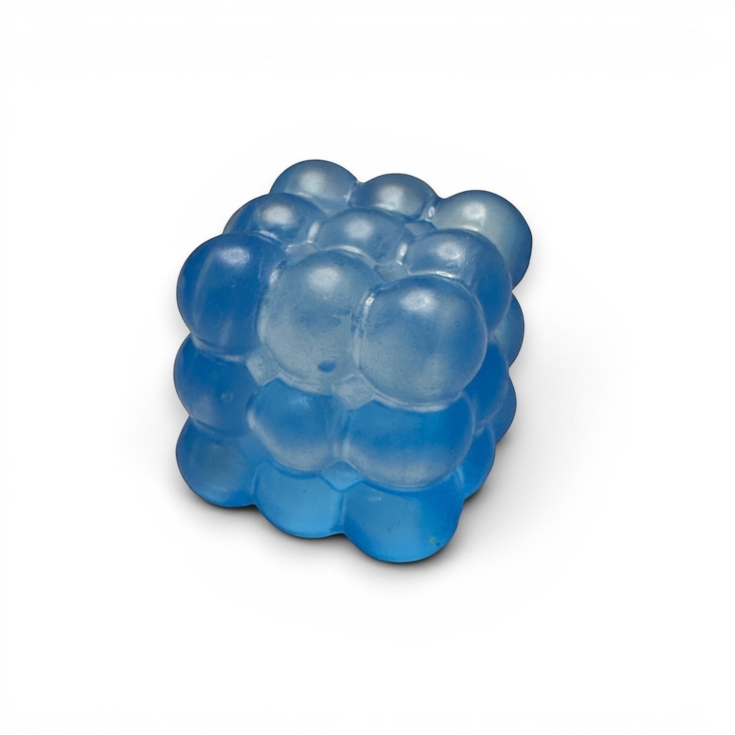 Mellow Monkey blue glittery bubble cube squeeze ball for stress relief and sensory fidgeting.