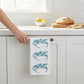 Mellow Monkey Blue Claw microfiber tea towel with Kim Hovell art, 16 x 24 inches, featuring three blue crabs.