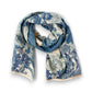 Mellow Monkey double-sided blue floral shawl scarf with soft acrylic fabric and delicate eyelash fringe trim.