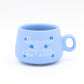 Mellow Monkey blue ceramic shot glass with white floral design and Undiagnosed But Something Ain't Right text