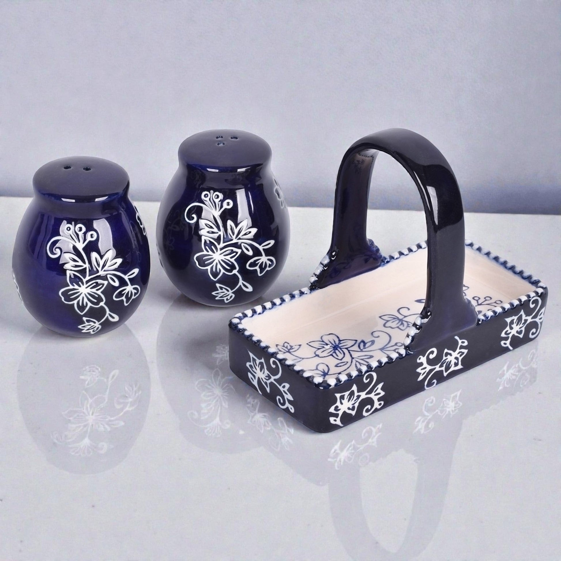 Mellow Monkey Temp-tations 3-piece stoneware salt and pepper shaker set with blue floral lace pattern and basket holder