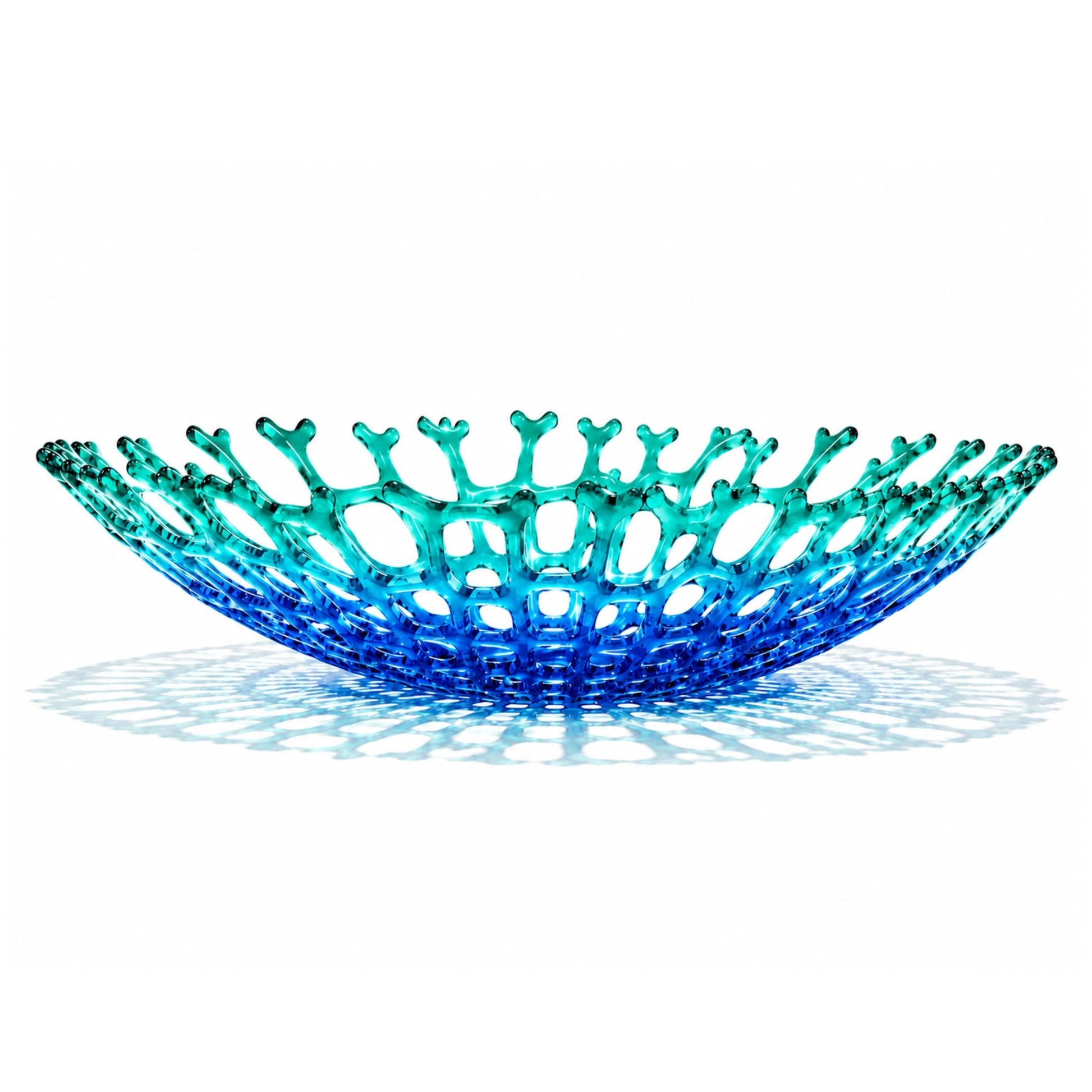Mellow Monkey handmade fused glass coral bowl in vibrant blue and teal with intricate reef-inspired texture.