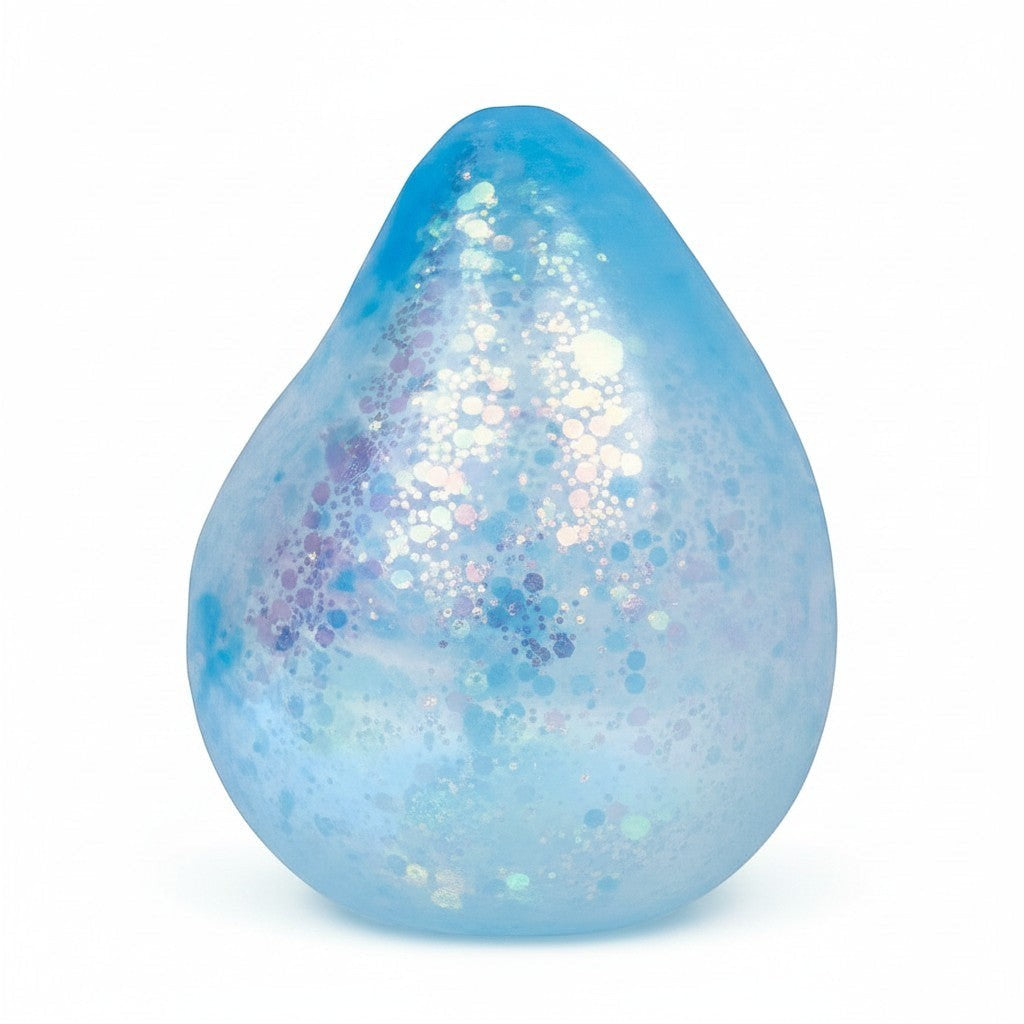 Mellow Monkey blue teardrop-shaped stress squishy with glittery accents for sensory fidgeting and anxiety relief.
