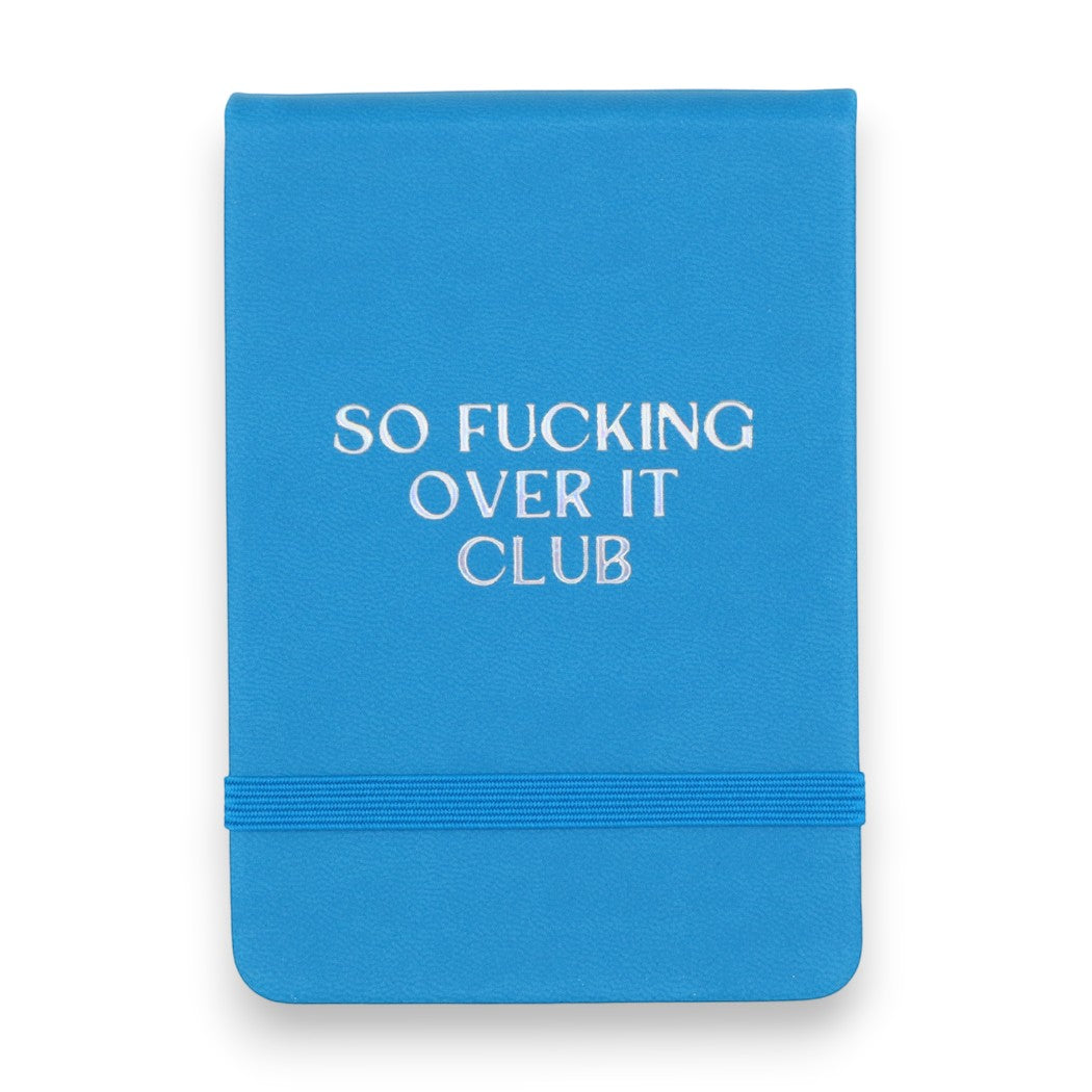 Mellow Monkey blue leatherette pocket journal with So Fucking Over It Club embossed on the cover and elastic band