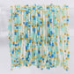 Mellow Monkey stretch seed bead bracelets in blue, mint, and white with 18k gold-plated brass accents.