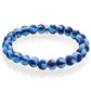 Mellow Monkey JILZARAH light blue and navy polymer clay beaded stretch bracelet with a silver accent bead