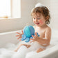 Mellow Monkey blue octopus bath toy with mesh texture and hanging loop. Ideal for water play.