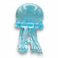 Mellow Monkey light blue translucent octopus squish toy with gold glitter swirl for sensory stress relief.