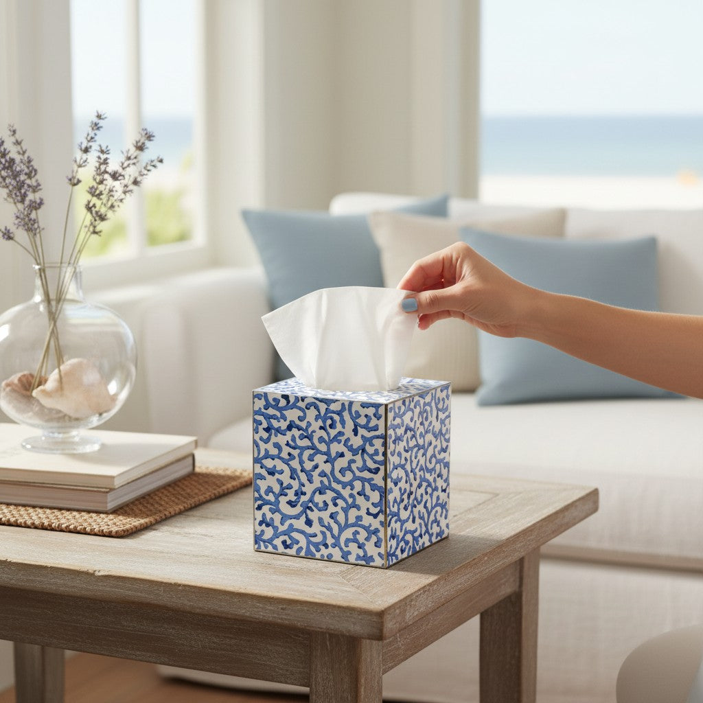 Mellow Monkey blue and white Waverly scroll papier mache tissue box cover with hand-painted gold edges on a table.