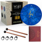 Mellow Monkey 6-inch blue steel tongue drum with 8 notes, mallets, and music book. Ideal for meditation and yoga.