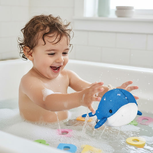 Mellow Monkey Blue Whale Bathtime Plush, a soft, blue and white whale toy with a loop for drying, perfect for water play.