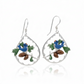 Mellow Monkey silver teardrop earrings featuring a bluebird on a branch with acorns and green needles