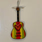 Mellow Monkey Bob Marley One Love guitar ornament with red, yellow, and green stripes and a heart design.