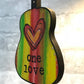 Mellow Monkey Bob Marley One Love guitar ornament with hand-painted Rasta stripes and heart design on wood.