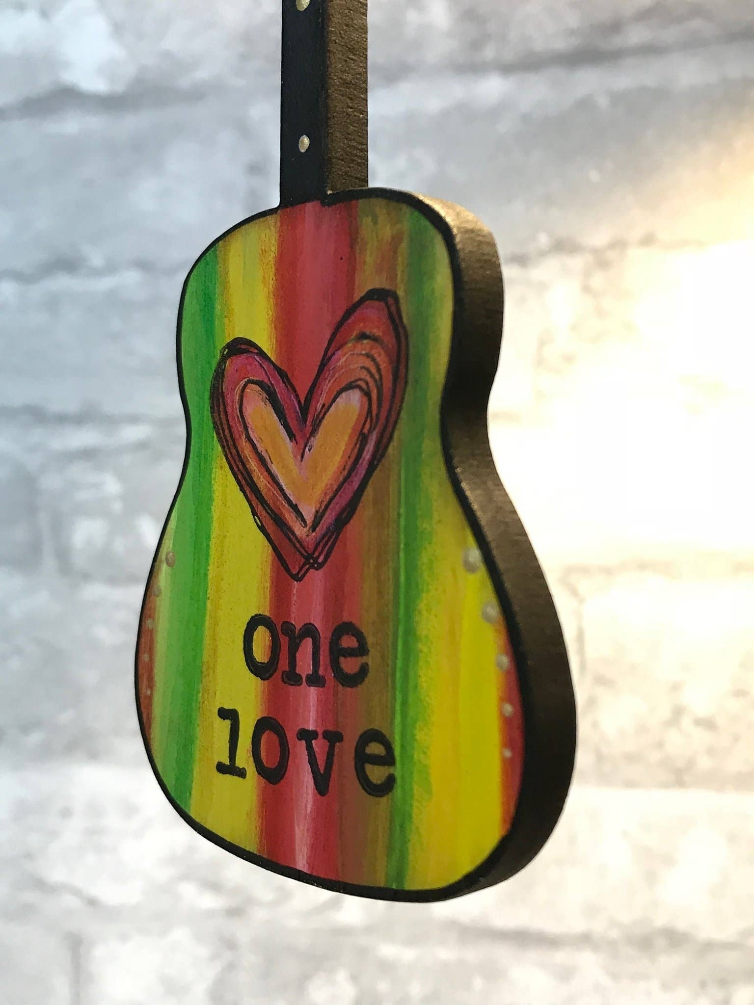 Mellow Monkey Bob Marley One Love guitar ornament with hand-painted Rasta stripes and heart design on wood.