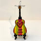 Mellow Monkey Bob Marley One Love guitar ornament with hand-painted Rasta stripes, heart design, and mini display easel.