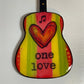 Mellow Monkey Bob Marley One Love guitar ornament featuring hand-painted red, yellow, and green stripes with a heart.