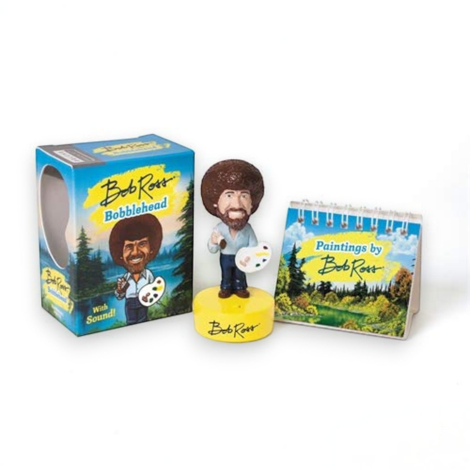 Mellow Monkey Bob Ross talking bobblehead kit with a mini easel book of landscape paintings and display box.