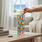 Mellow Monkey 8-inch Bossanova Venetian glass bud vase with a colorful handpainted mosaic pattern on a wooden table.