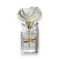 Mellow Monkey Apothecary Guild Botanical Oasis diffuser with white rose top and gold dragonfly accent. Black Fig Vetiver scent.