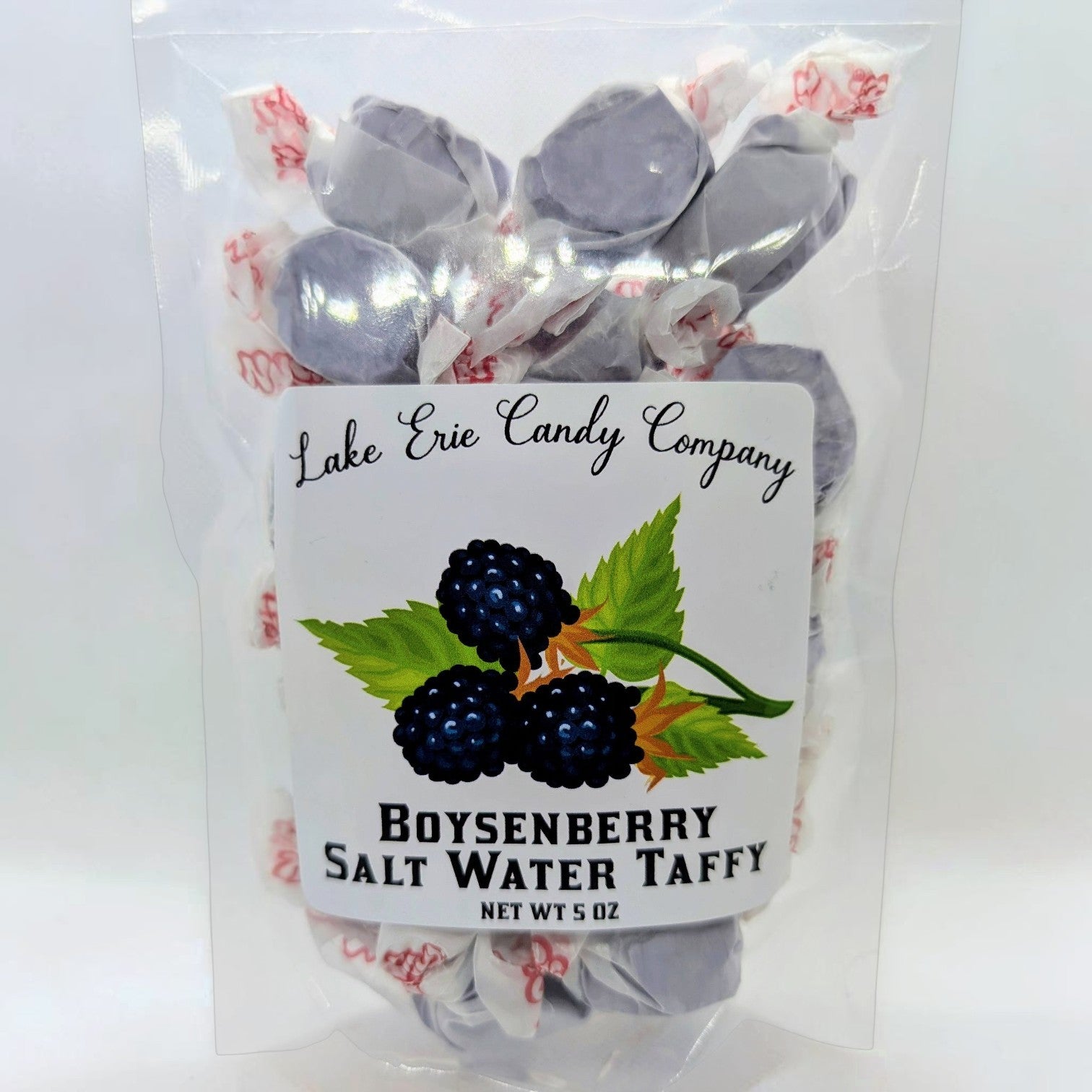 Mellow Monkey Boysenberry Salt Water Taffy, individually wrapped purple candies with a sweet berry flavor and melt-in-your-mouth texture.