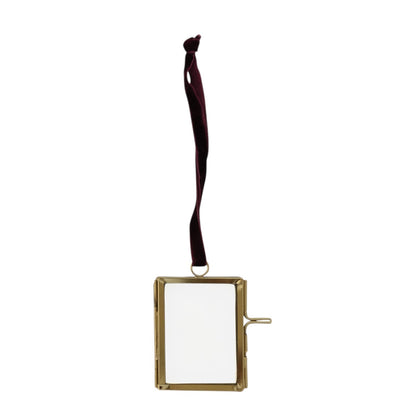Mellow Monkey brass and glass photo frame ornament with a deep red velvet ribbon hanger for holiday tree display.