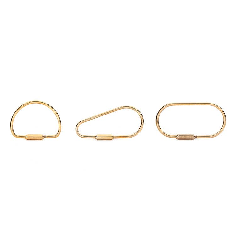 Mellow Monkey set of three assorted brass keyrings with secure screw-in clasps on a clean white background