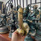 Mellow Monkey 6-inch brass wall hook with an antique gold finish and a unique phallic design for eclectic decor.