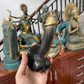 Mellow Monkey 6-inch antique brass wall hook shaped like a phallus with a dark patina and polished gold-tone tip.