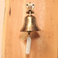 Mellow Monkey 4" brass wall bell with a white braided cotton pull cord, vintage farmhouse style.