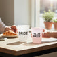 Mellow Monkey Bride Squad frost flex party cups, pack of 8. White cup says BRIDE, pink cup says TEAM BRIDE.