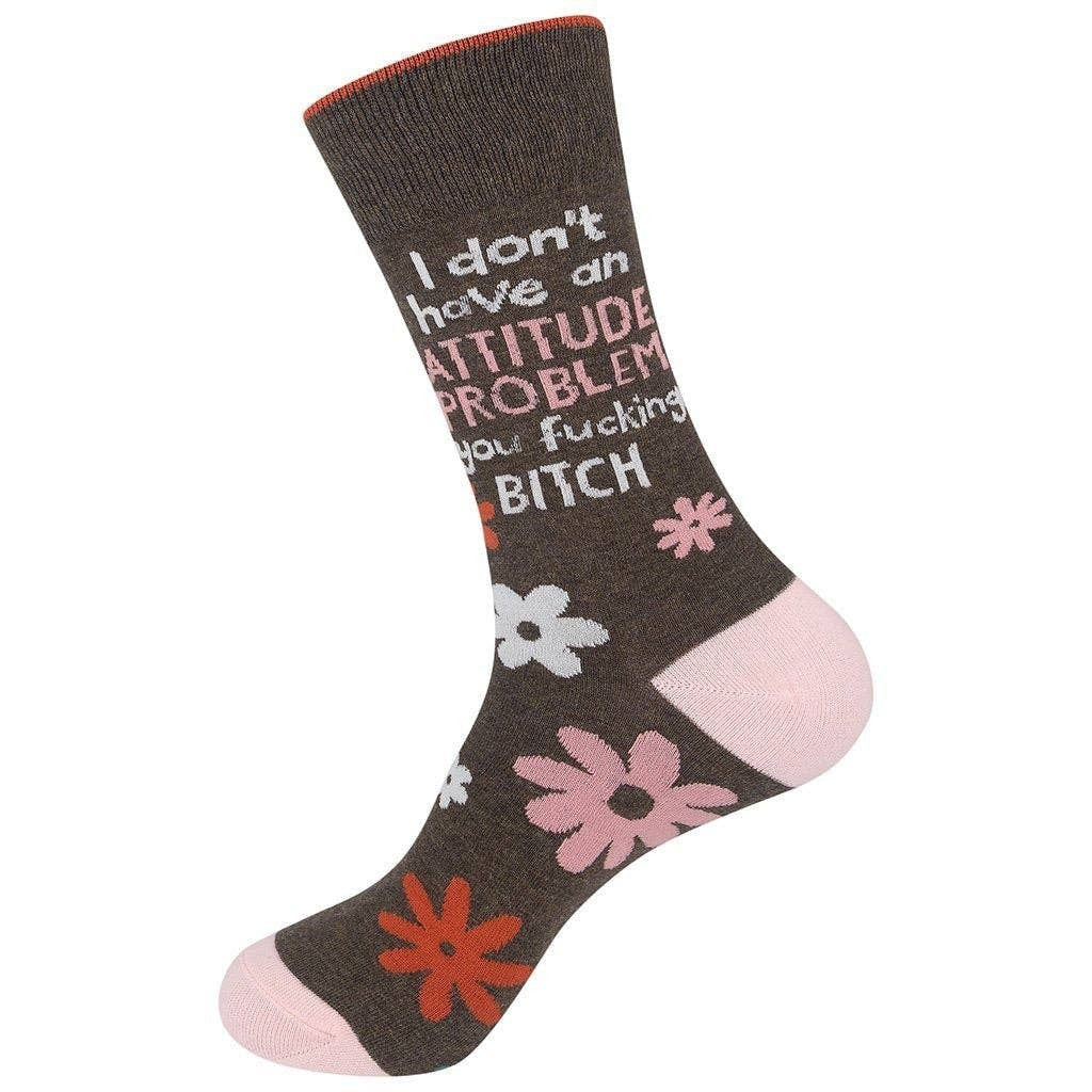 Mellow Monkey brown crew socks with floral pattern, blush pink heel and toe, and sarcastic text in white and pink.