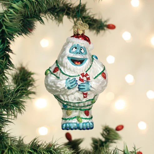 Mellow Monkey Bumble the Abominable Snow Monster Christmas ornament, 4.5-in blown glass with Santa hat and candy cane.
